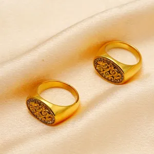 Vintage oval signet rings in gold finish with rose carving and zircon stones