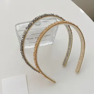 Detail of crystal embellished headbands with anti-slip teeth and sparkling rhinestones