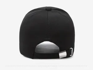 Close-up of the back of a black baseball cap with adjustable silver metal buckle