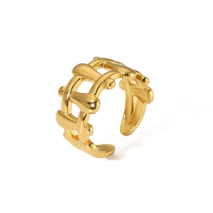 Macro detail of 18k gold plated stainless steel ring featuring a mesh woven cutout design