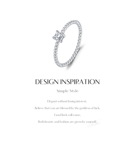 Detail of S925 silver ring featuring a square cut gemstone and beaded band design