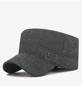 Detail of dark grey winter cadet cap for men showing textured fabric and sport logo