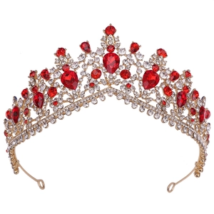 Detail of bridal tiara with sparkling rhinestones and red teardrop crystal accents
