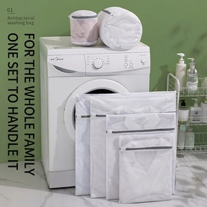 Set of 6 durable white honeycomb mesh laundry bags with grey zippers for washing machines