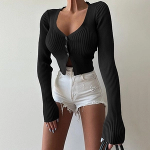 Detail of black rib-knit V-neck cardigan featuring three buttons and a slim fit cut