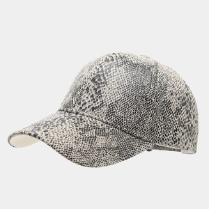 Detailed close-up of snake skin textured baseball cap showing grey and black faux leather pattern