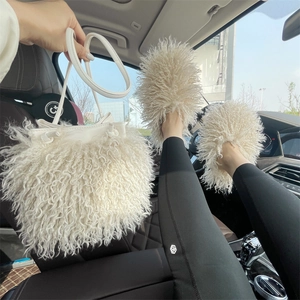 Faux sheepskin plush bucket bag and matching slippers set in a lifestyle car setting