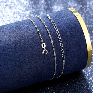 Macro shot of 925 sterling silver water wave chain necklace with S925 engraved clasp