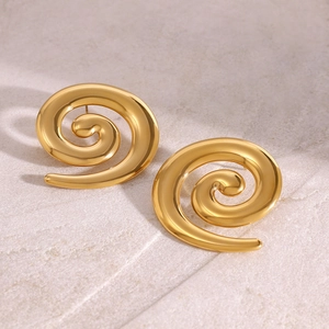 Minimalist 18k gold plated stainless steel spiral earrings on stone background