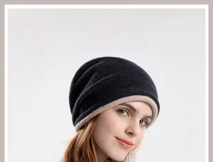 Detail of knitted beanie showing the two-tone rolled edge and warm textured fabric
