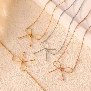 Minimalist bow pendant necklace set in gold, silver and rose gold steel bead chains