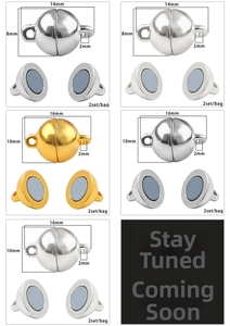 Macro view of spherical magnetic jewelry clasps in gold and silver for DIY necklace crafts