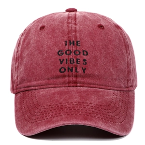 Red washed cotton baseball cap with The Good Vibes Only embroidery and curved brim