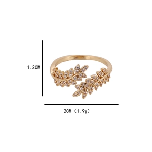 Golden double leaf open ring with sparkling white cubic zirconia in minimalist style
