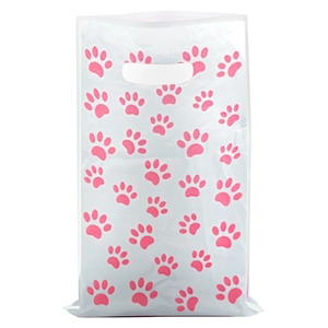 Detail of white plastic gift bag with pink paw prints and die-cut handles