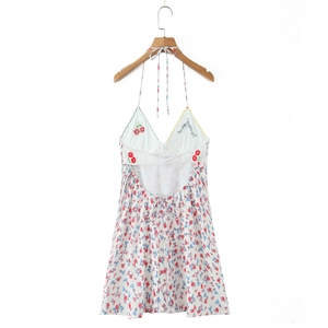 White halter dress with cherry embroidery and floral pattern for a sweet summer style