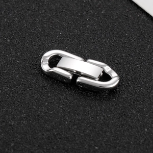 Close-up of a polished silver stainless steel jewelry clasp for necklaces and bracelets