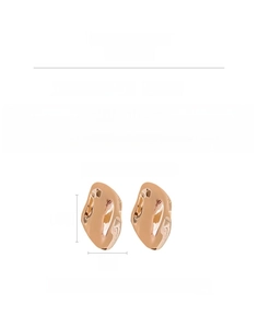 Macro detail of irregular gold oval earrings featuring wavy texture and 4.5cm length