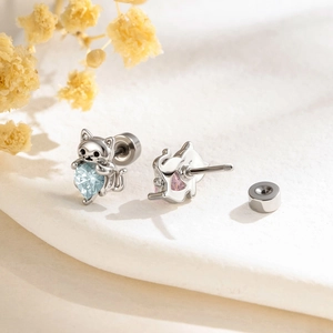 Cute kitten stud earrings in titanium steel featuring pink and blue zircon heart stones