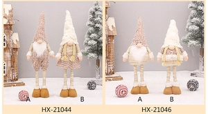 Close-up of telescopic Christmas faceless gnomes with warm white and brown knitted fabric