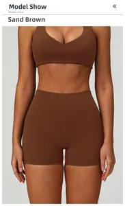 Detailed front view of high-waist sandy brown yoga shorts and matching V-neck sports bra