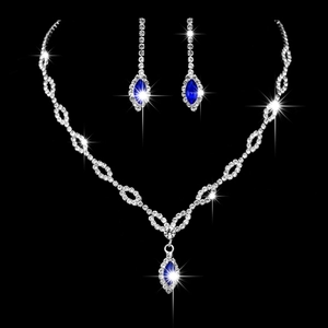 Parure de bijoux de mariée argentée avec pierres bleu roi en goutte et cristaux brillants