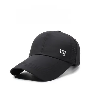 Detail showing the breathable side mesh and embroidered white ny logo on a black baseball cap