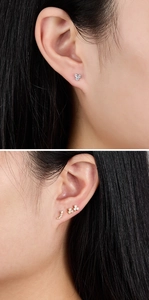 Close-up of minimalist S925 silver flower stud earrings with sparkling zircon stones