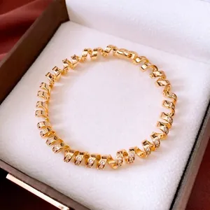 Elegant 18K gold plated twisted spiral bracelet with sparkling micro zircon crystals