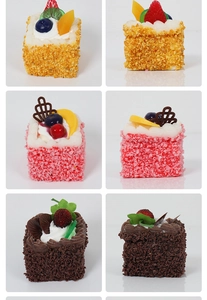 Detail view showing three styles of realistic PU mousse cake and fruit dessert models
