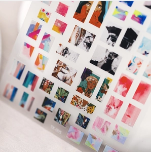 Macro shot of minimalist artistic nail stickers with vintage illustrations and matte finish