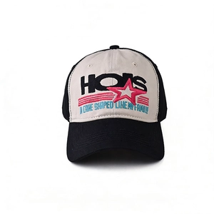 Close-up of contrast stitch baseball cap with HOTS embroidery and star detail