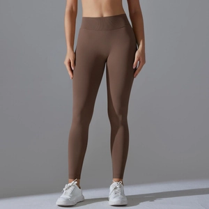 Detail view of coffee brown seamless high waist yoga pants with elastic v-waistband
