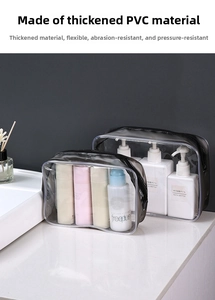Detail view of two thick waterproof PVC toiletry bags with black zippers on marble surface
