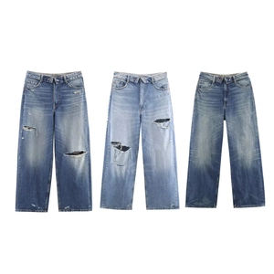 Jeans larges à taille mi-haute avec taille repliée et détails déchirés en trois délavages