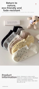 Detail shot of multi-color cotton polka dot no-show socks in black grey yellow and pink