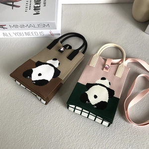 Minimalist knit panda handbag in brown and pink with top handle and shoulder strap