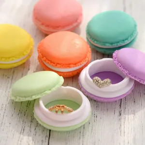 Mini macaron style jewelry boxes in various colors for portable ring and earring storage