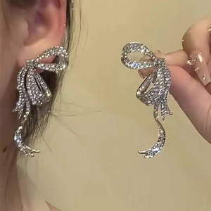 Bowknot silver needle earrings with teardrop tassels and sparkling rhinestones for women