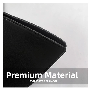 Close-up of industrial stitching and premium texture on black punk leather handbag