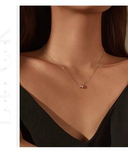 Model wearing S925 silver necklace with pink rose-cut diamond in octagon pendant