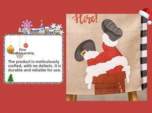Detailed view of burlap Christmas chair cover with Santa climbing chimney pattern