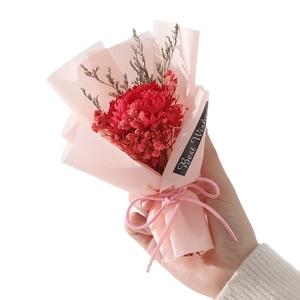 Handcrafted sunflower and dried flower bouquet with Best Wishes card in pink wrap