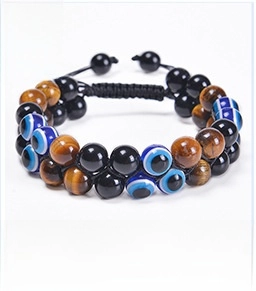 Close-up of double-layer evil eye bracelet with tiger eye beads and braided cord