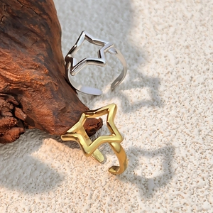 Minimalist gold and silver hollow star open rings with a polished stainless steel finish