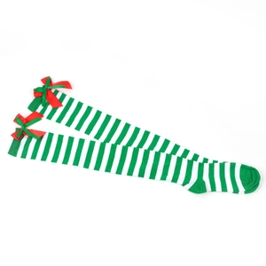 Detail of green and white striped over-knee socks featuring festive red ribbon bows