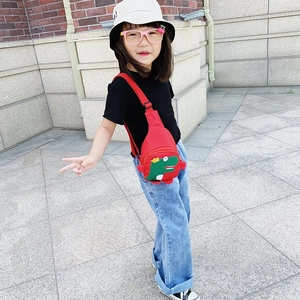 Cute red canvas dinosaur chest bag for children with adjustable black shoulder strap