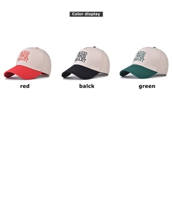 Detailed view of color block cotton baseball caps with Bless Your Heart embroidery