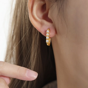 Elegant gold-plated geometric hoop earrings with four white pearls for women