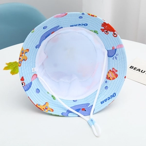 Detail view of children's sun hat featuring blue ocean print and breathable inner lining